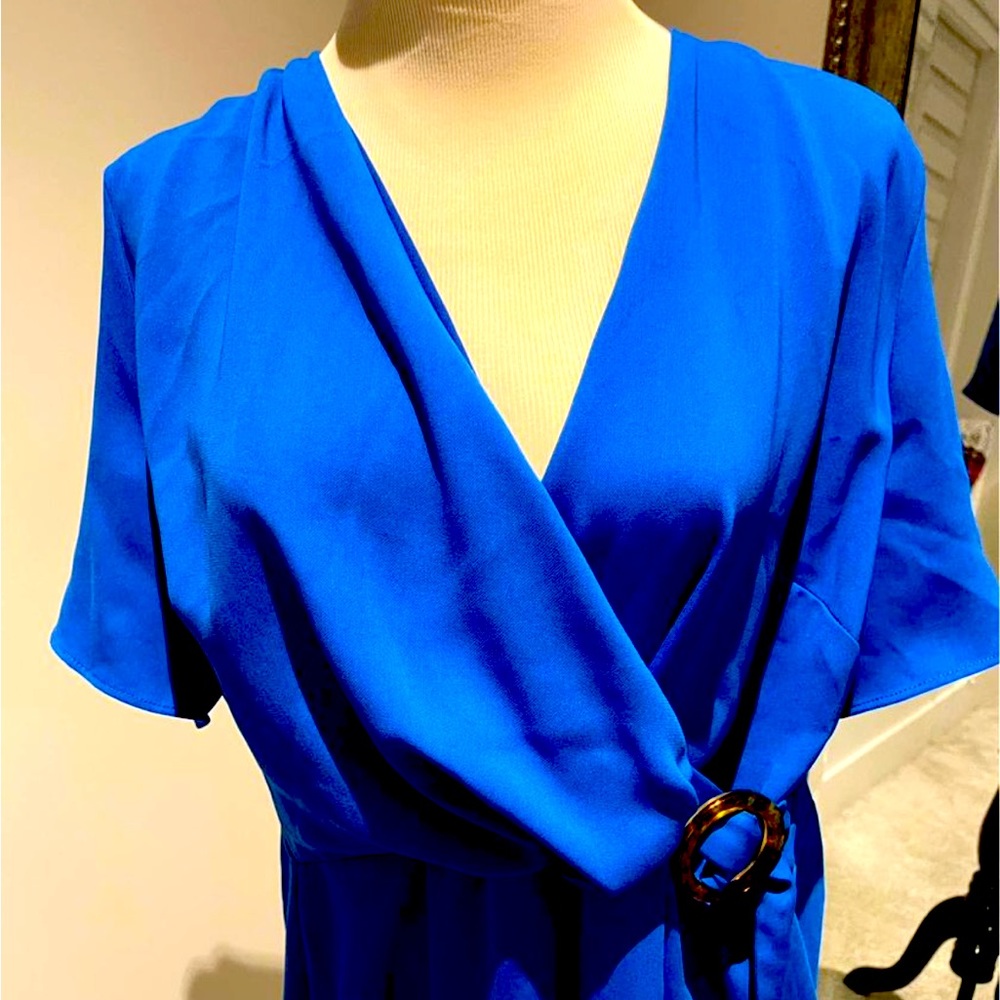 UK Next brand - £65 ($100 cad) Size 12 so flattering !